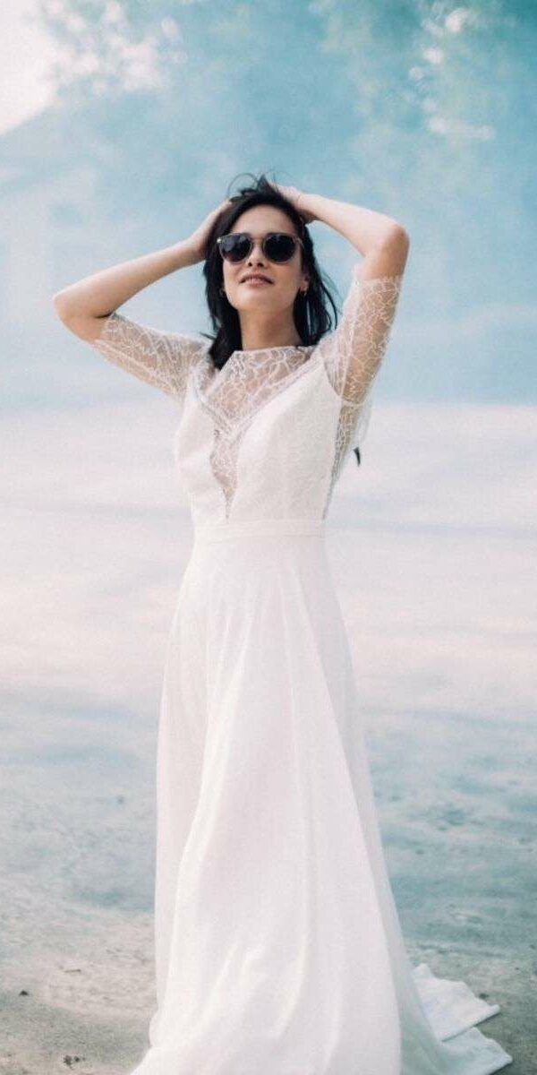 Robe de mariée col bateau en dentelle et mousseline fluide